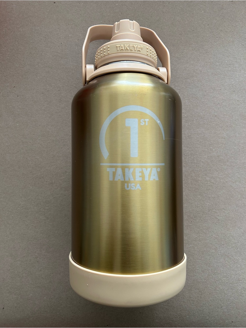Takeya Limited Edition 64oz Gold Stainless Steel Water Bottle with Cream Handle